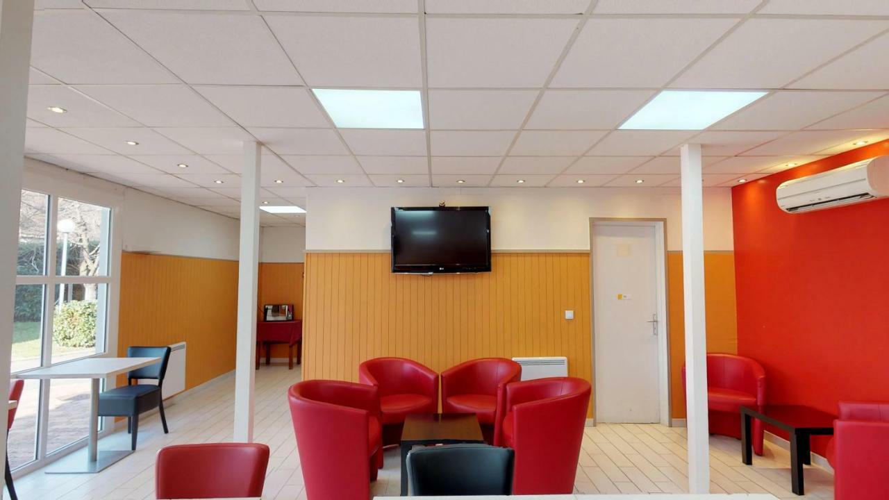 Kyriad Direct Acheres Exteriör bild