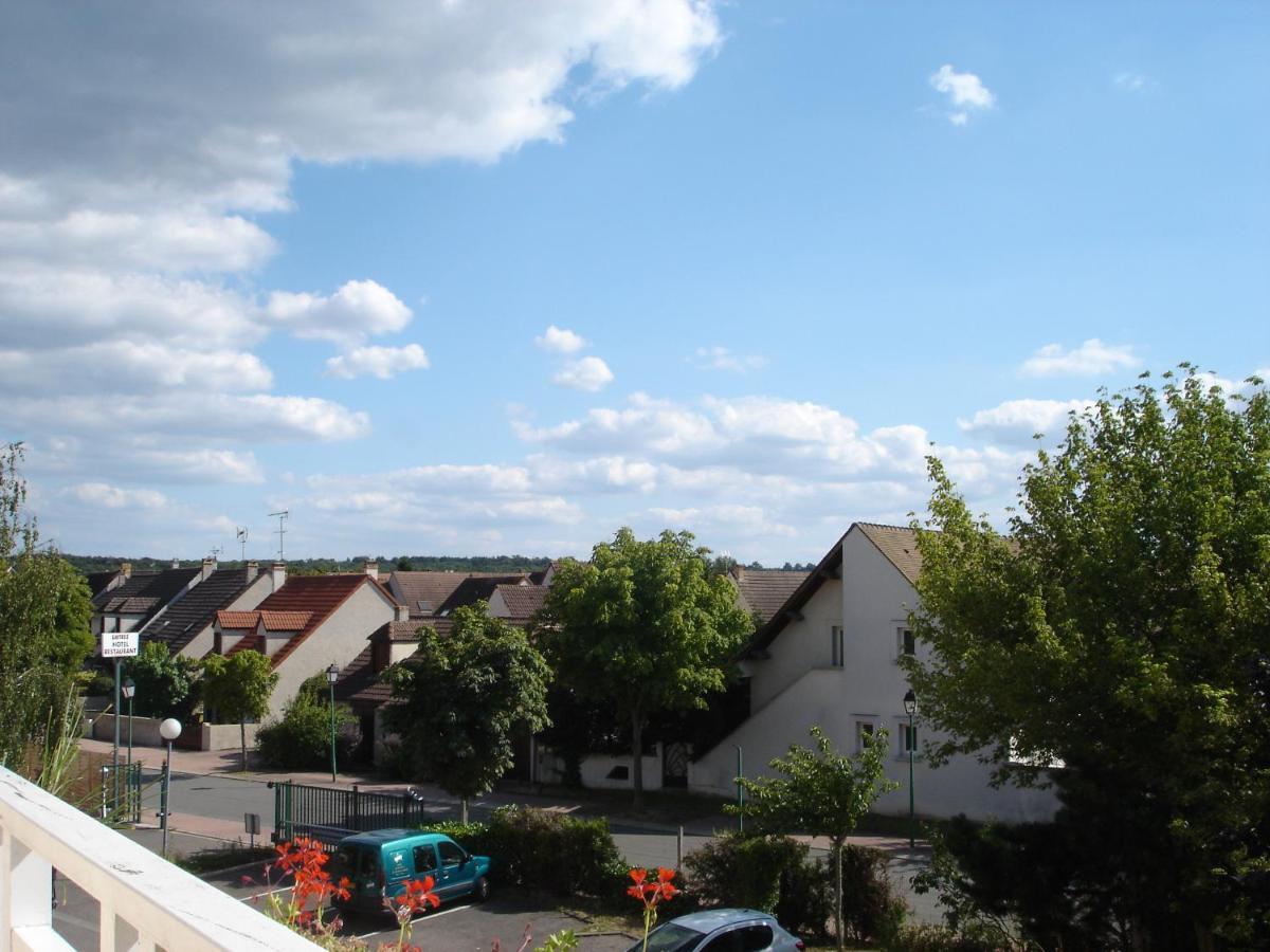 Kyriad Direct Acheres Exteriör bild